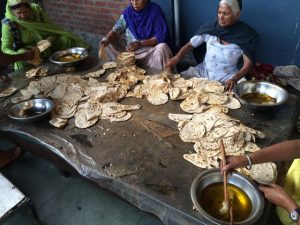 Buttering Naan