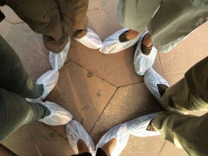 Us and our booties before going into the Taj Maha