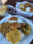 Street cafe with dhaal, chicken, and different curries
