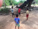 Kids playing outside of the temple